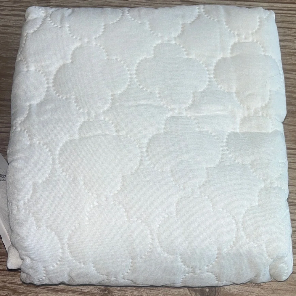 New stain defense crib mattress pad